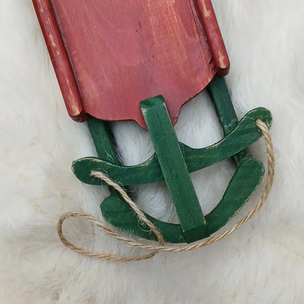 White Rabbit Fur Christmas Stocking with Red and Green Sled